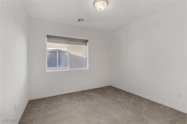 unfurnished room with carpet floors