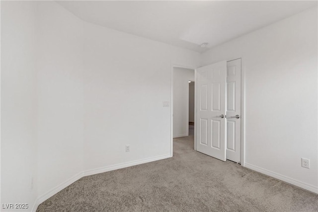 7075 Jasper Hill Way, Las Vegas, NV 89118 - spare room featuring light carpet and baseboards