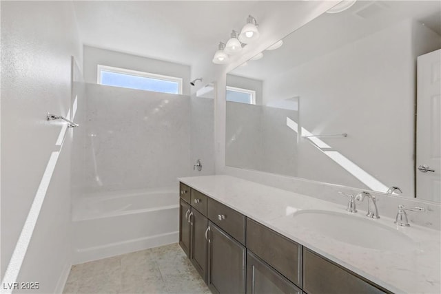 bathroom with shower / bathing tub combination, vanity, and tile patterned flooring