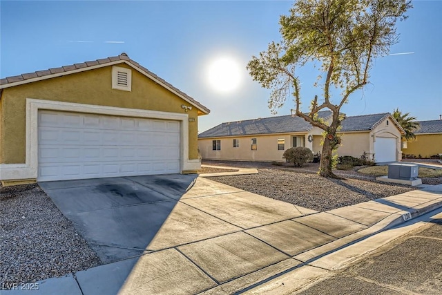 single story home featuring a garage