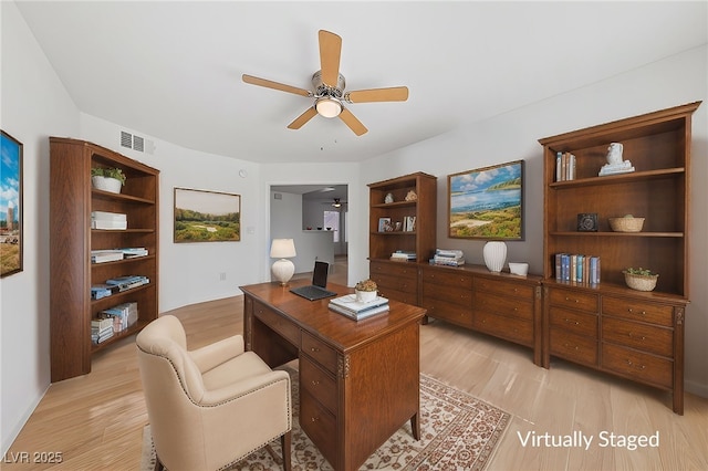 office area with ceiling fan and light wood-type flooring