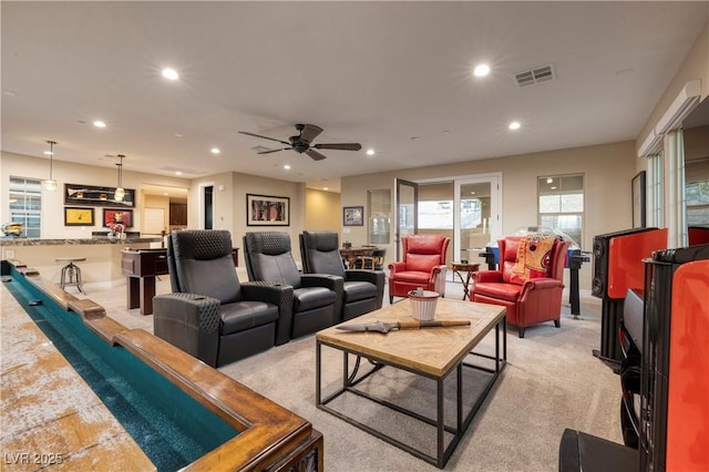 living room featuring light carpet