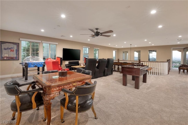 recreation room featuring light carpet