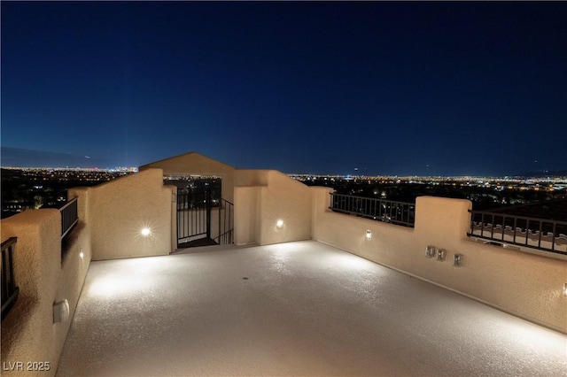 view of patio at twilight