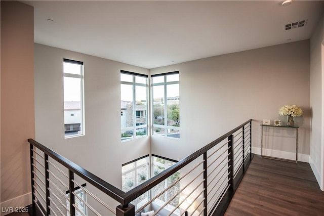 stairway with wood-type flooring