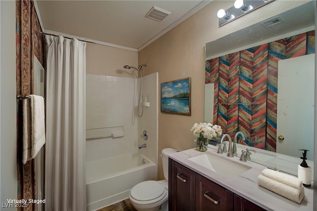 full bathroom with vanity, crown molding, shower / bath combo, and toilet