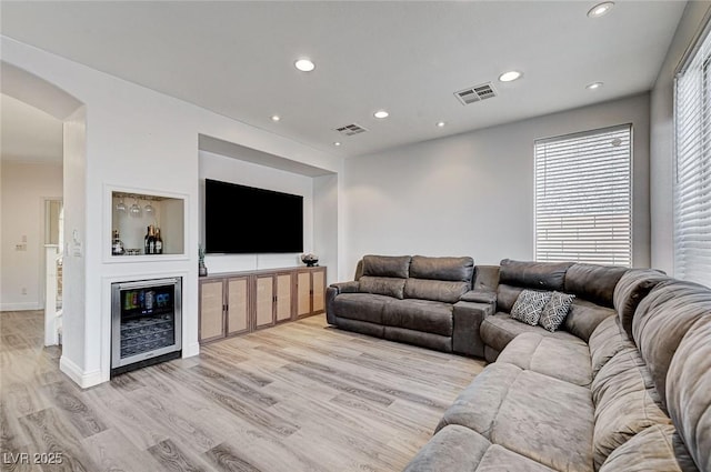 living room with light hardwood / wood-style floors