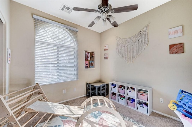 carpeted bedroom featuring ceiling fan