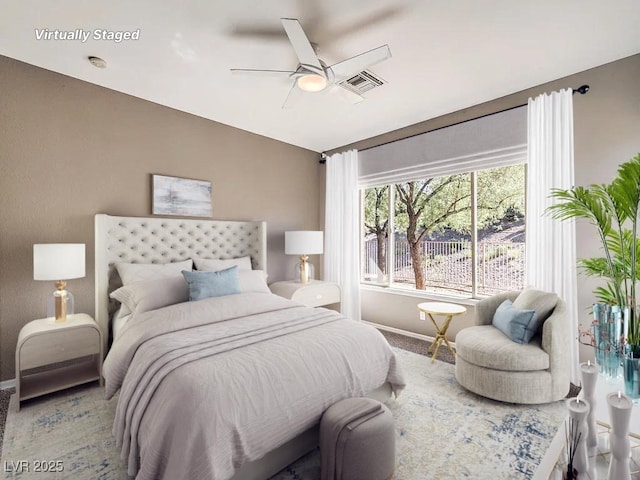 carpeted bedroom featuring ceiling fan