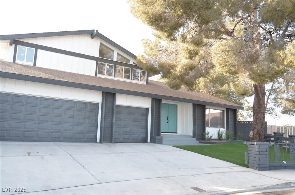 view of front of property with a garage