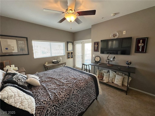 bedroom with ceiling fan and carpet floors