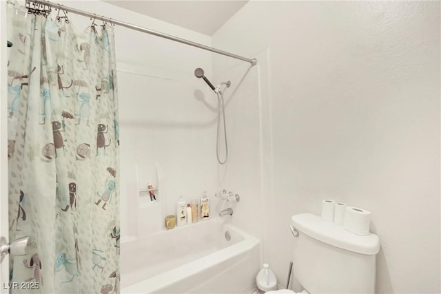 bathroom with shower / tub combo and toilet