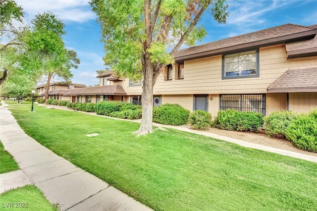 exterior space with a front lawn