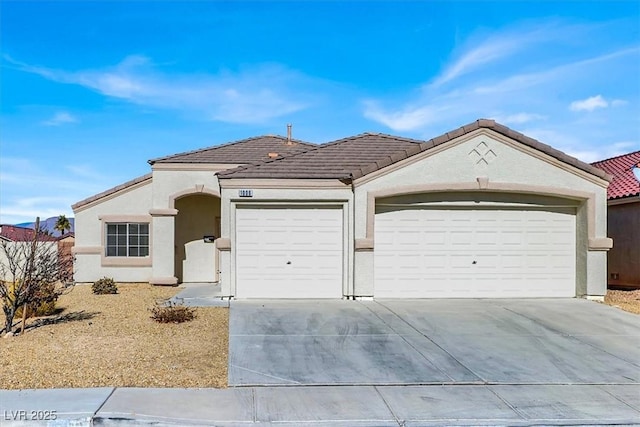 ranch-style home with a garage