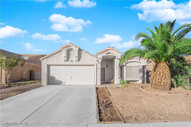 view of front of home with a garage