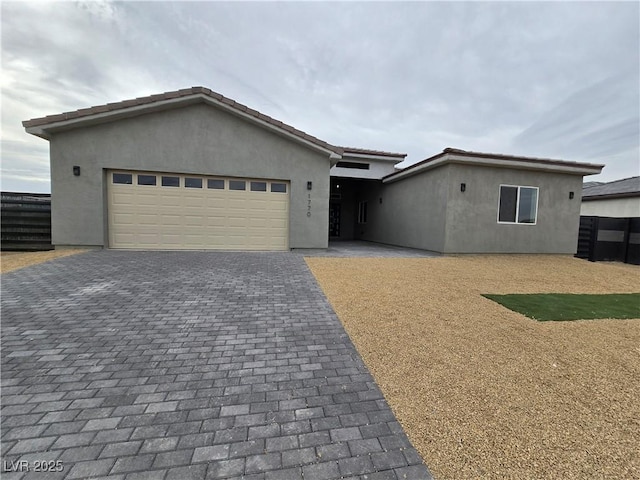 view of front of property featuring a garage