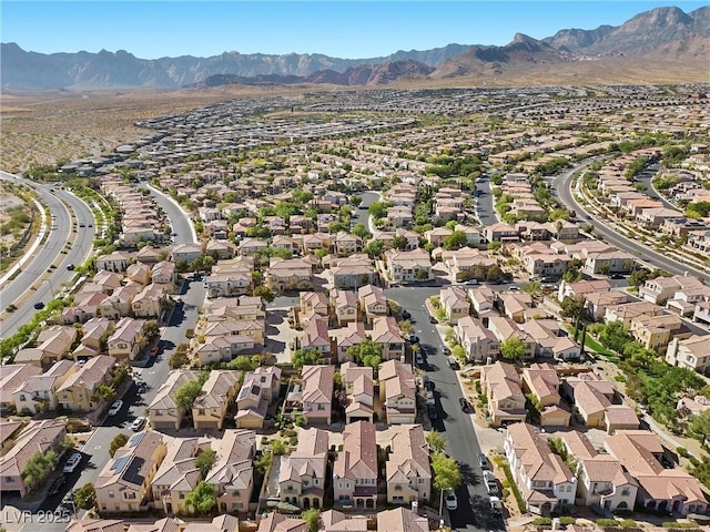 drone / aerial view featuring a mountain view