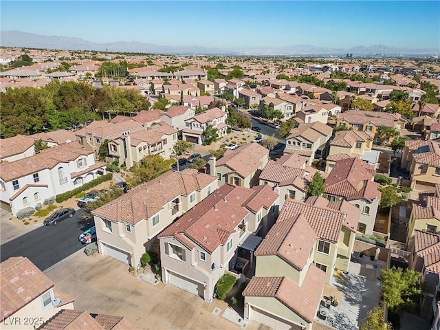 birds eye view of property featuring a mountain view