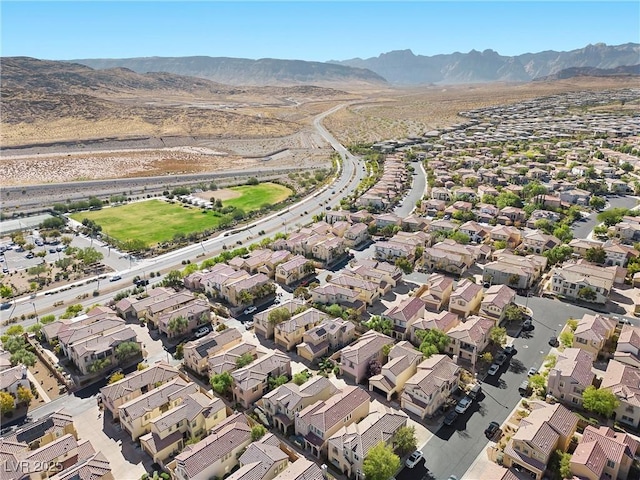 drone / aerial view featuring a mountain view