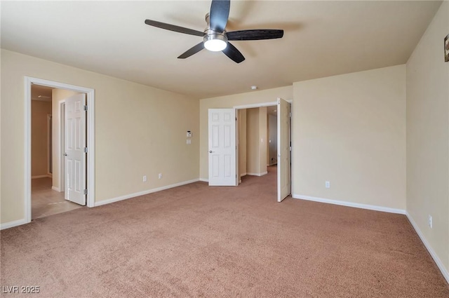 unfurnished bedroom with ceiling fan and light colored carpet