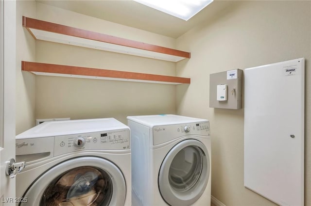 laundry room with washing machine and dryer