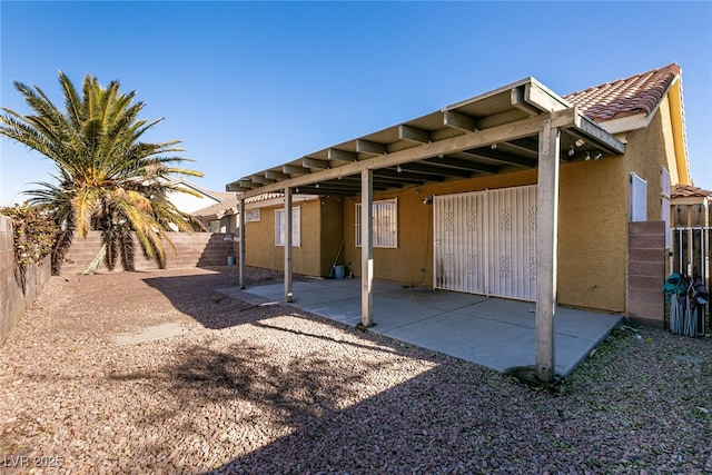 rear view of house featuring a patio area