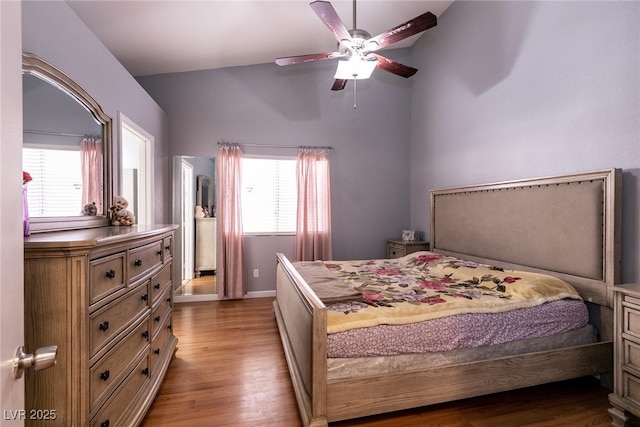 bedroom featuring ceiling fan and light hardwood / wood-style floors