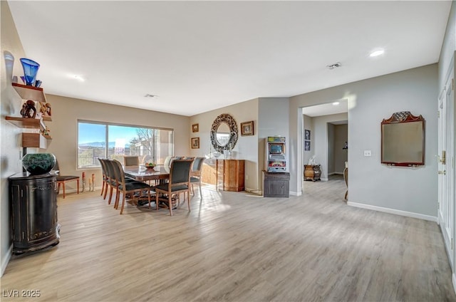 dining room featuring light hardwood / wood-style flooring