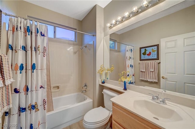 full bathroom with toilet, vanity, and shower / bathtub combination with curtain