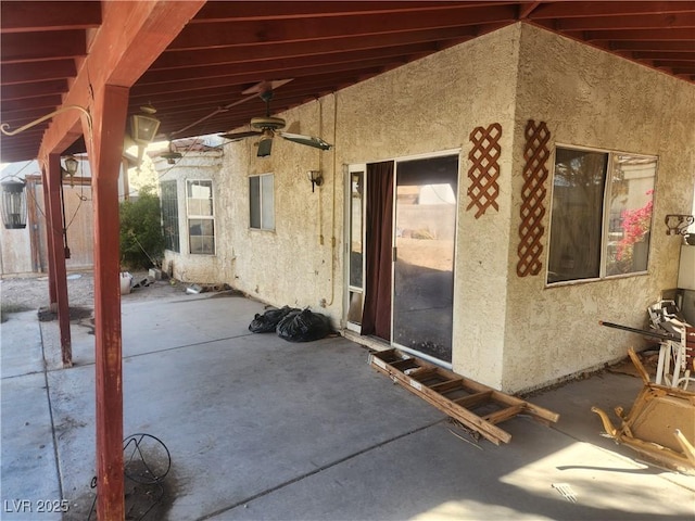 view of patio / terrace featuring ceiling fan