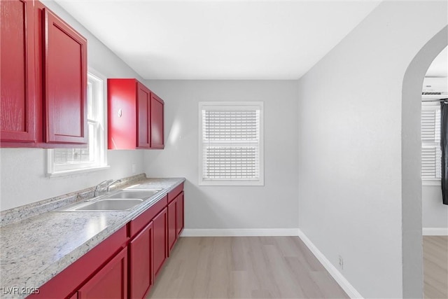 kitchen featuring light hardwood / wood-style floors and sink