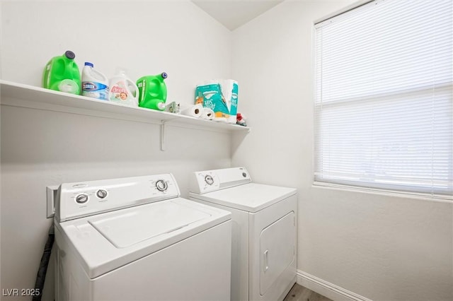 washroom featuring separate washer and dryer