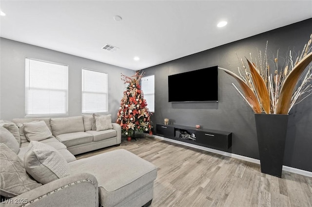 living room featuring light hardwood / wood-style flooring