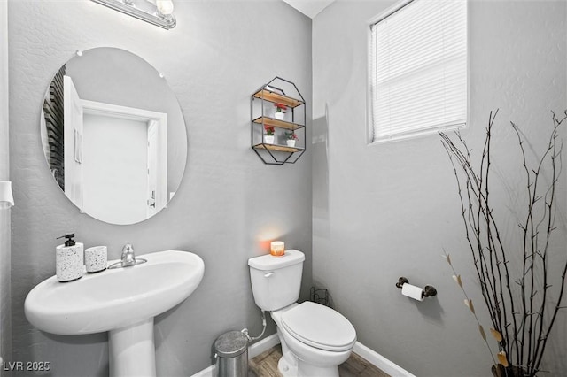 bathroom with sink and toilet