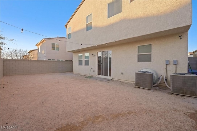 back of property with central AC unit