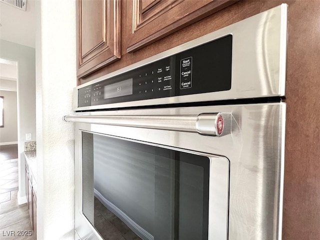 details featuring stainless steel double oven