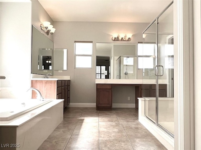 bathroom with vanity, tile patterned floors, and independent shower and bath