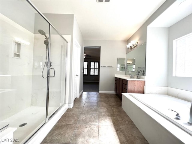 bathroom with ceiling fan, vanity, independent shower and bath, and tile patterned flooring