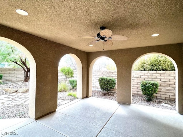 view of patio / terrace featuring ceiling fan