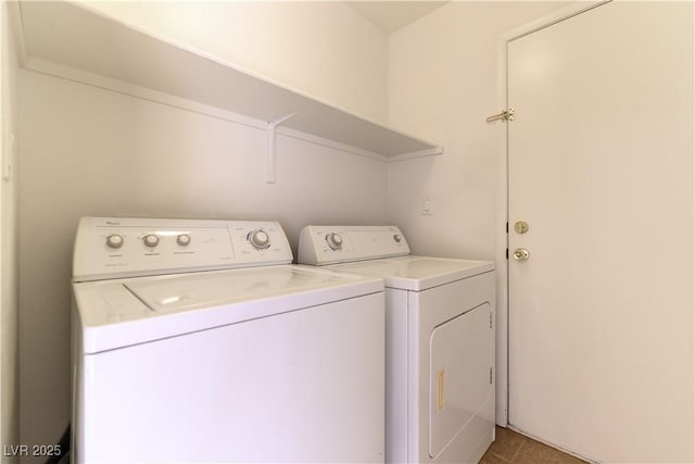 washroom with light tile patterned floors and independent washer and dryer