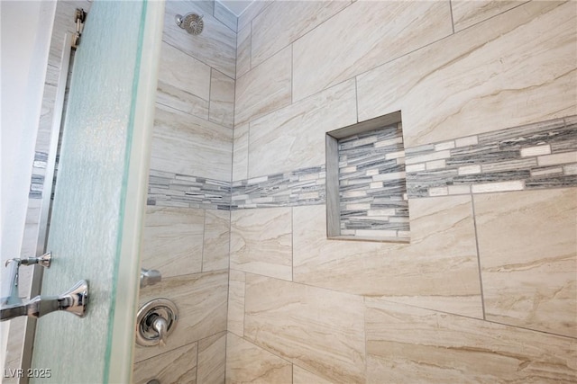 details with a tile shower