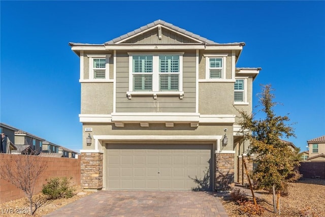 view of front of property with a garage