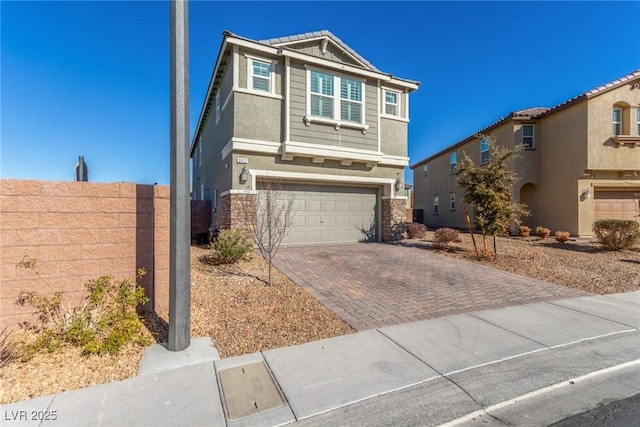 view of front of home with a garage