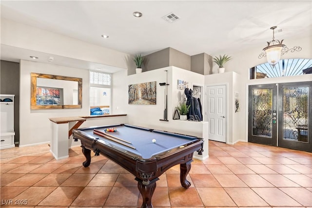 game room featuring light tile patterned flooring, pool table, and french doors