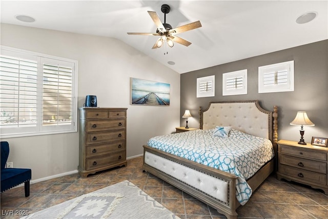 bedroom featuring lofted ceiling and ceiling fan