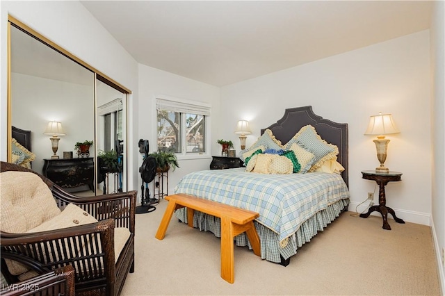 bedroom with a closet and carpet