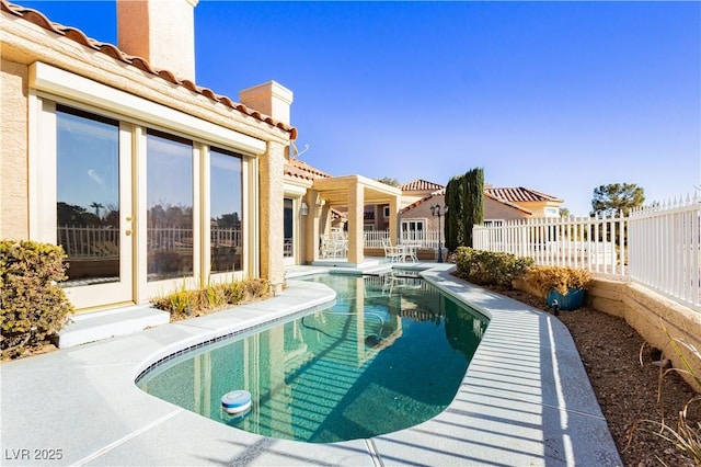 view of swimming pool with a patio area