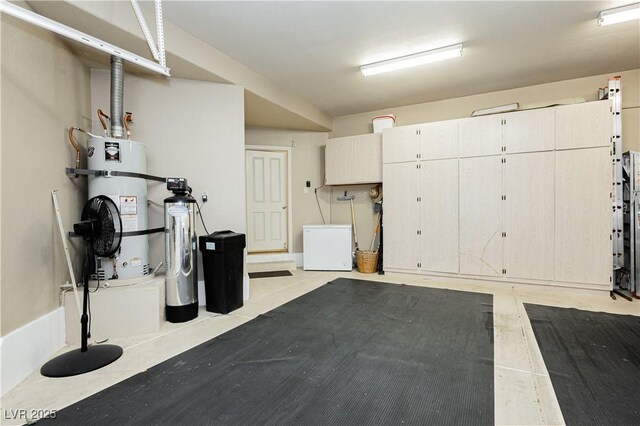 garage featuring secured water heater