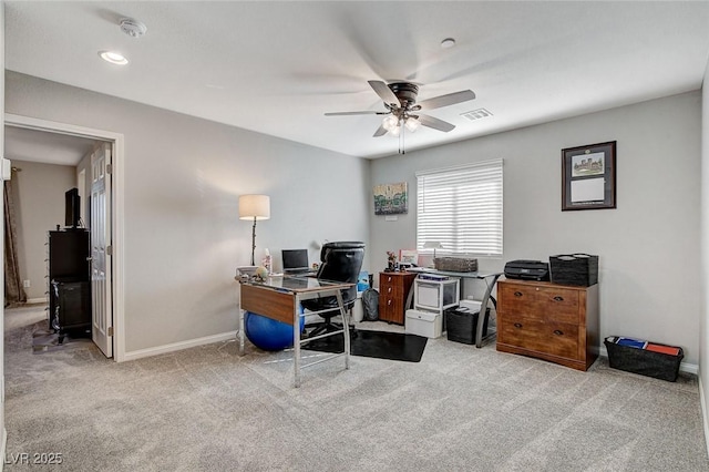 office area featuring ceiling fan and light colored carpet