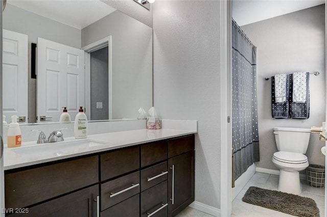 bathroom with vanity, a shower with curtain, tile patterned floors, and toilet